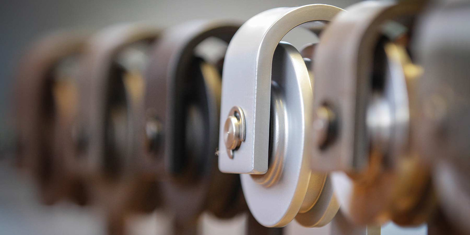 Close-up shot of barn door hardware hangers.