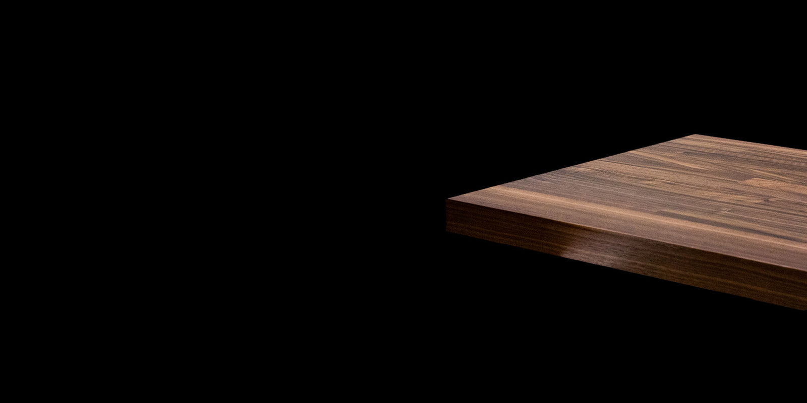 Walnut Butcher Block by RealCraft on a Black Background