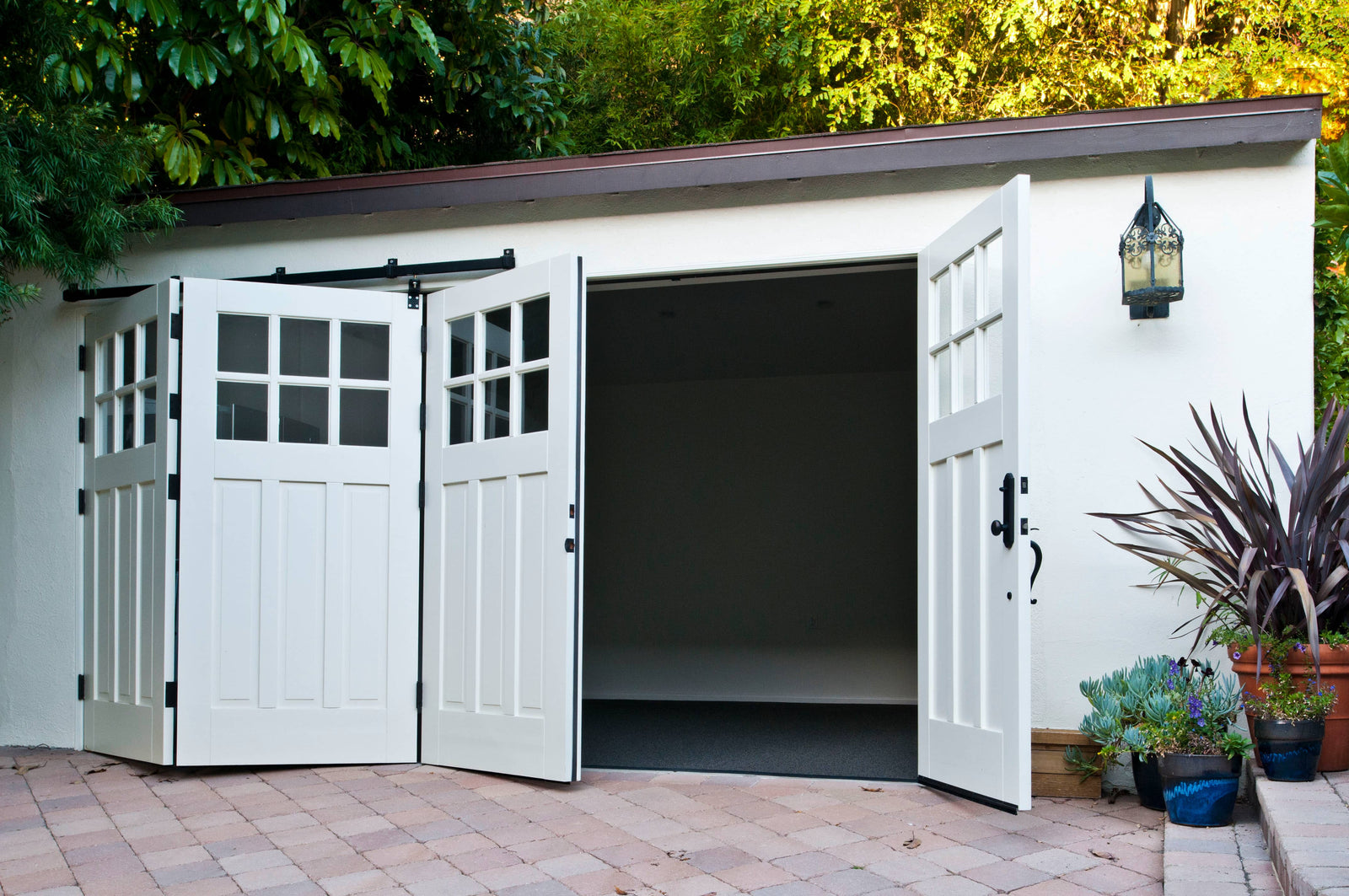 Folding Garage door with box rail barn door hardware