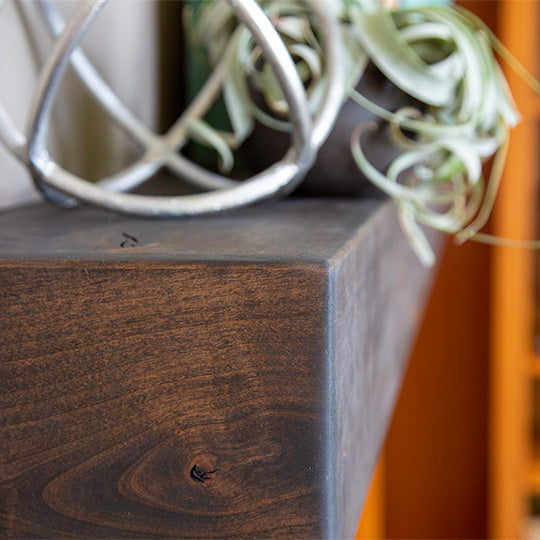 closeup shot of the edges of a fireplace mantel