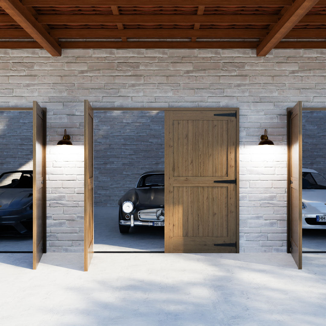 Marblemount Carriage Style Garage Doors whit three Luxury Cars