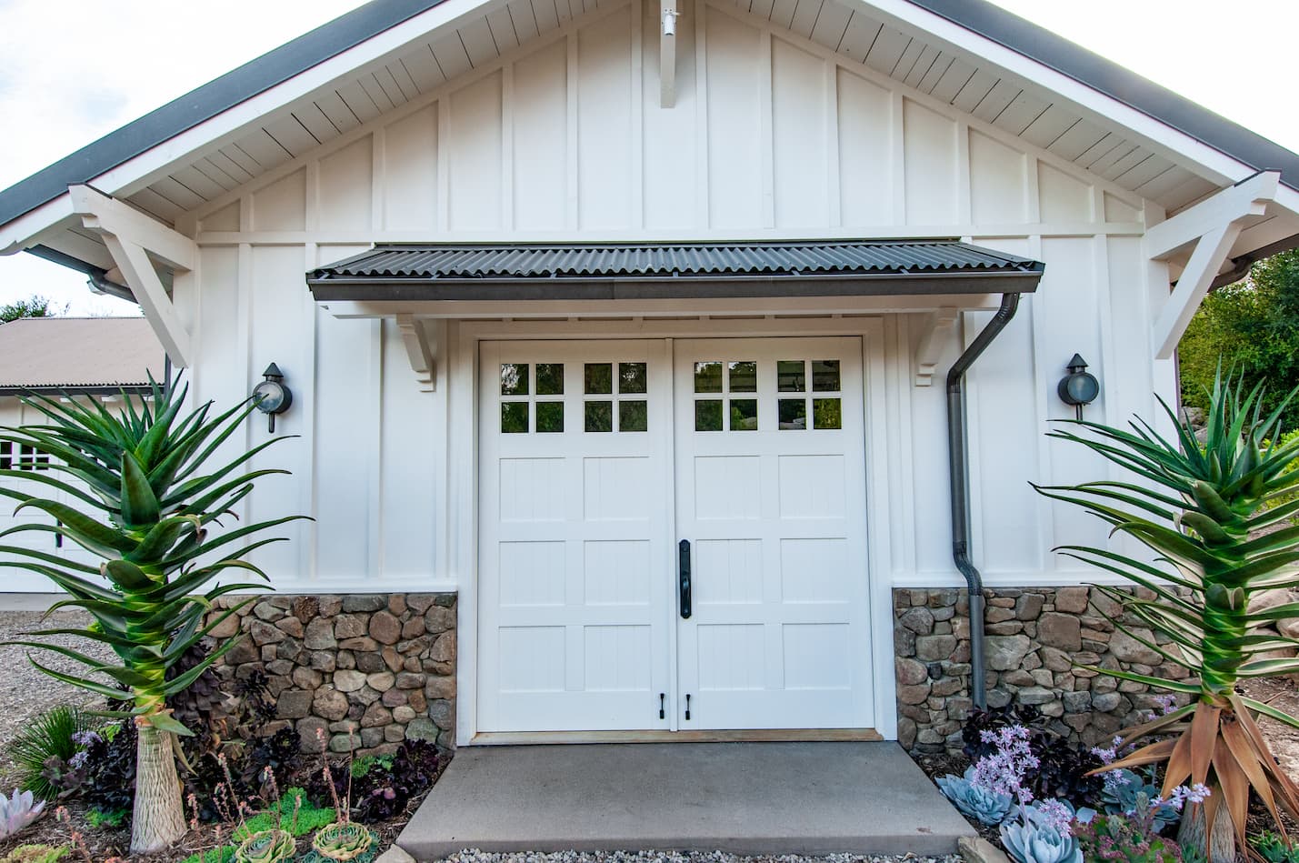 White Carriage door on garden area