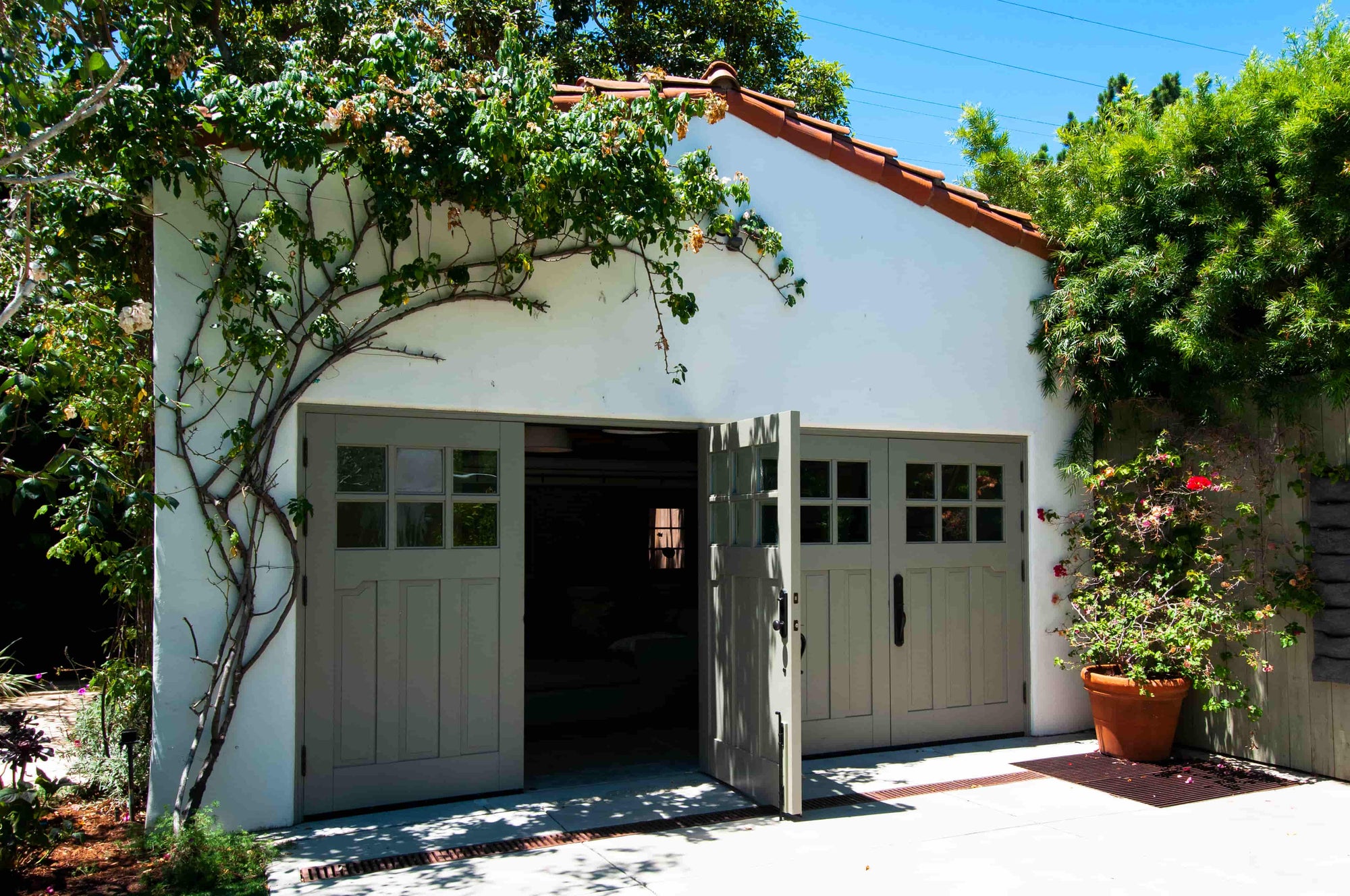 Green Carriage Door set on patio area