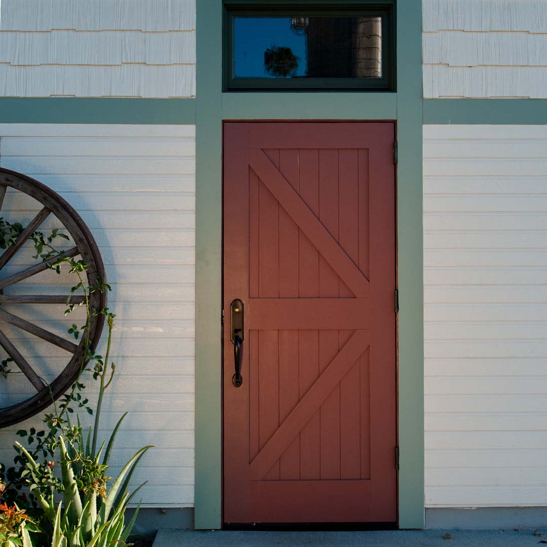 Red British Brace front door on a commercial building