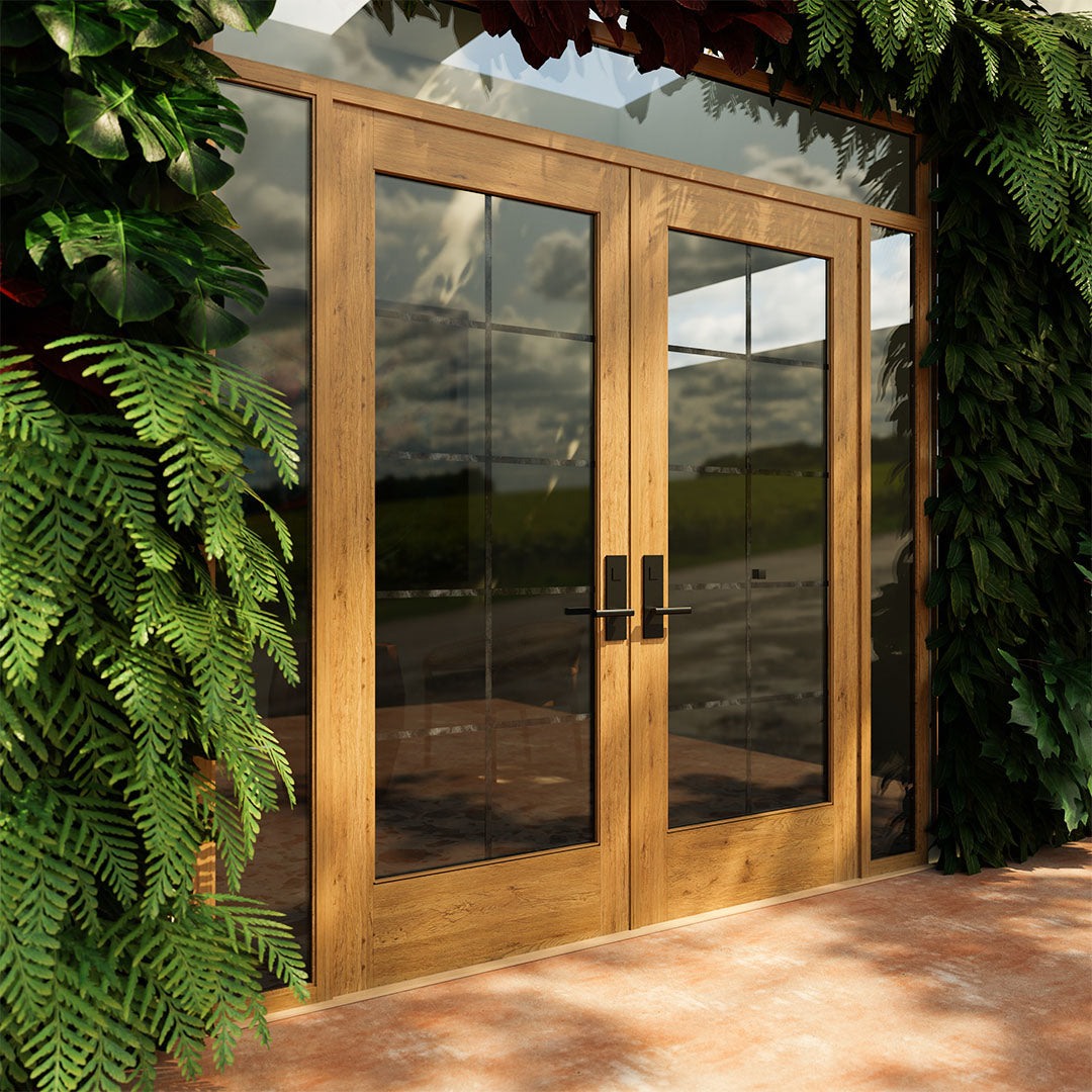 Side view of White Oak Full Panel French Glass Exterior Double Doors next to a plant wall