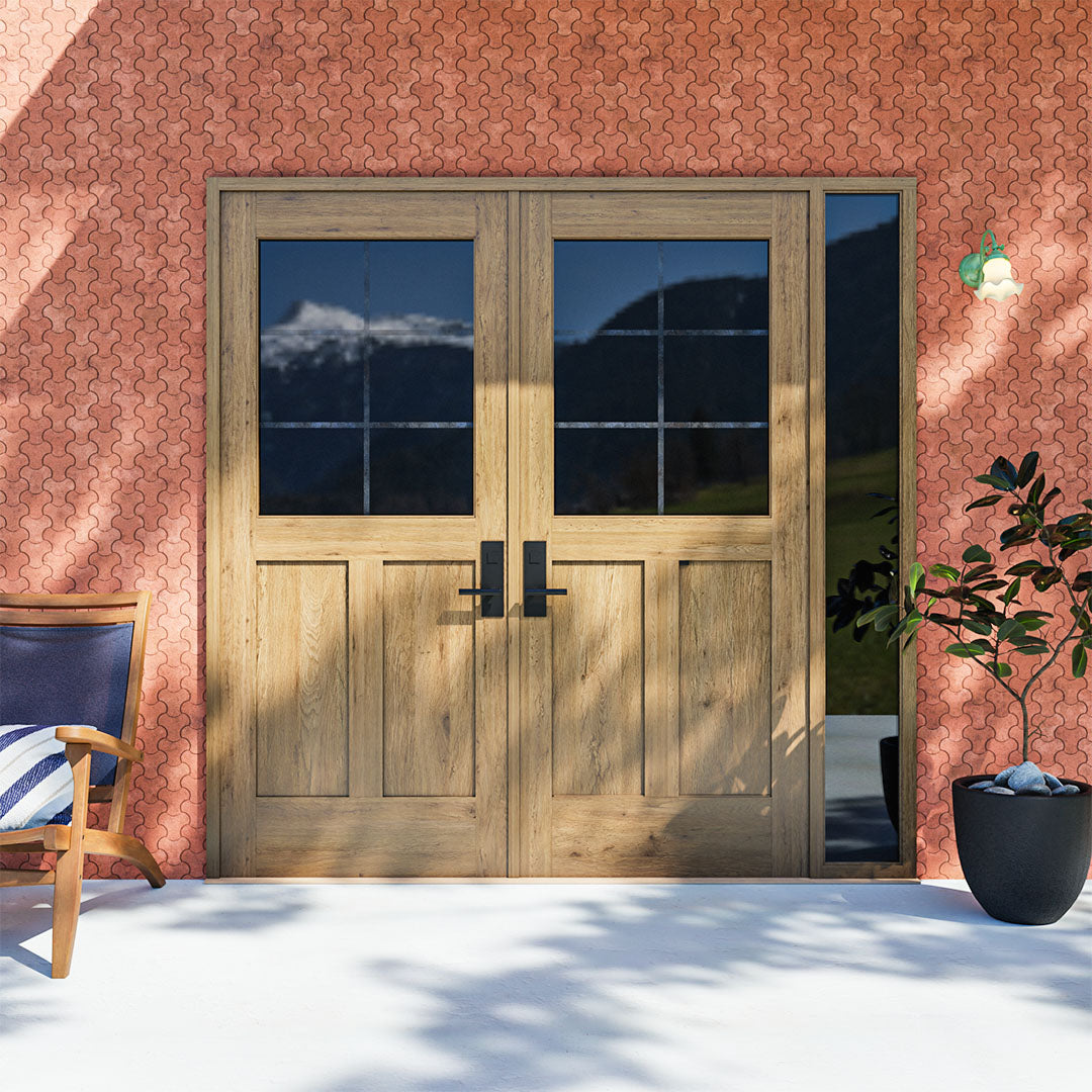 White Oak Half Glass French Double Doors with right sidelight on a red brick wall next to a potted plant an a lounge chair.