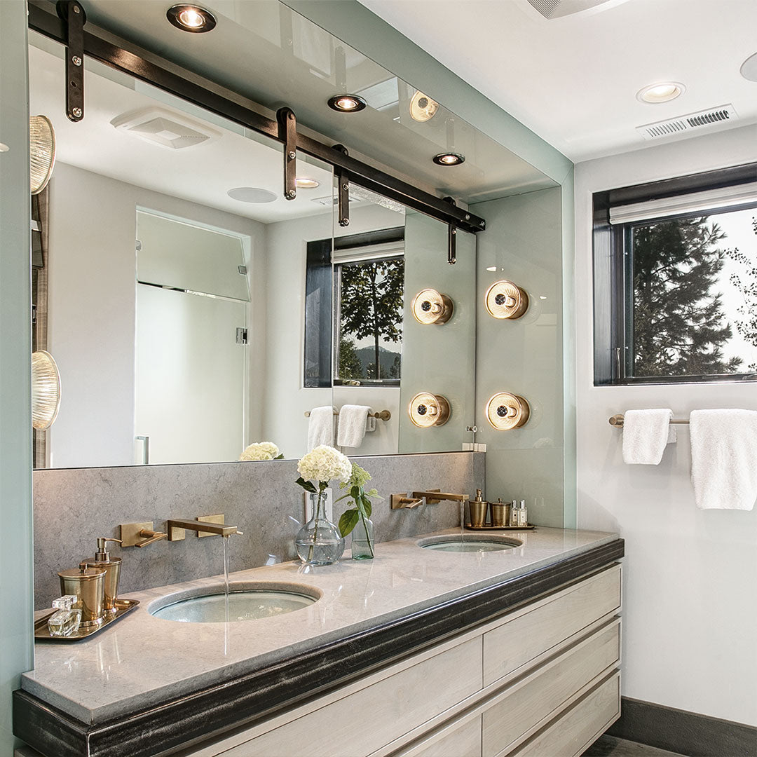 barn door hardware installed on glass panes