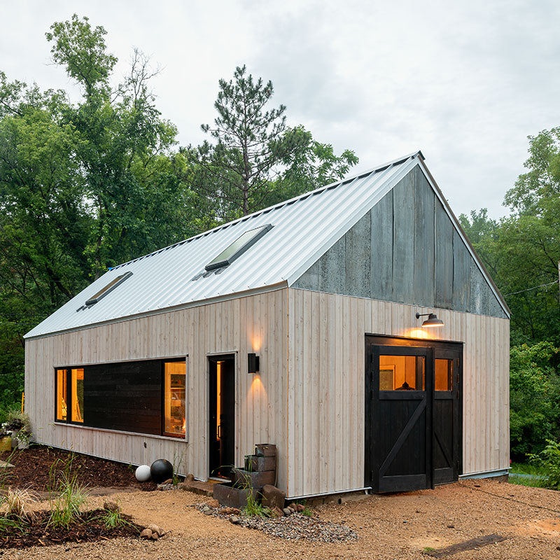 barn with black carriage doors