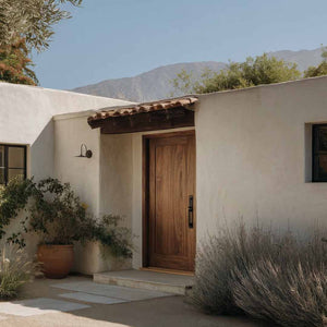 Casa de Campo house exterior with wooden door and mountain view