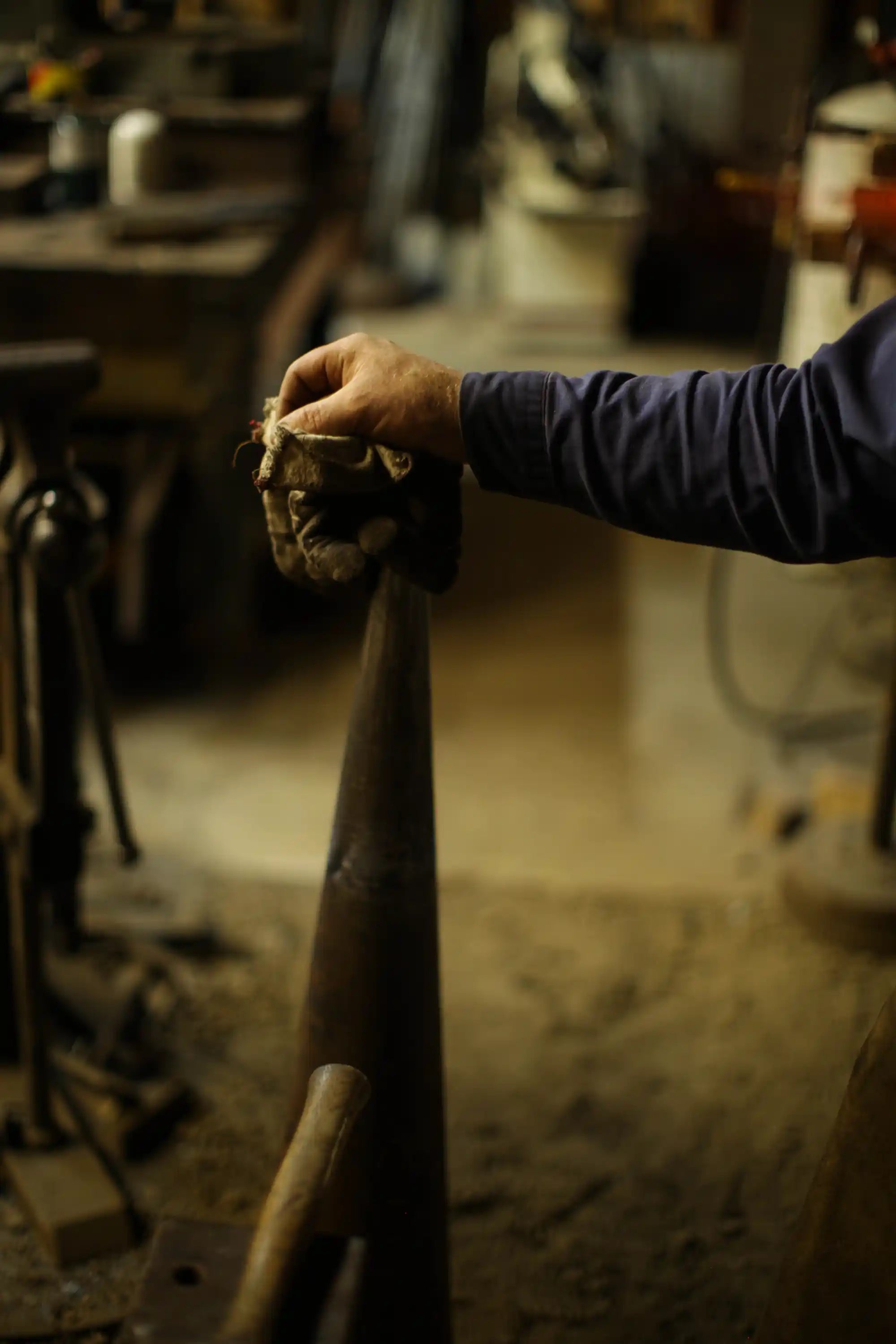 Blacksmith next to his tool
