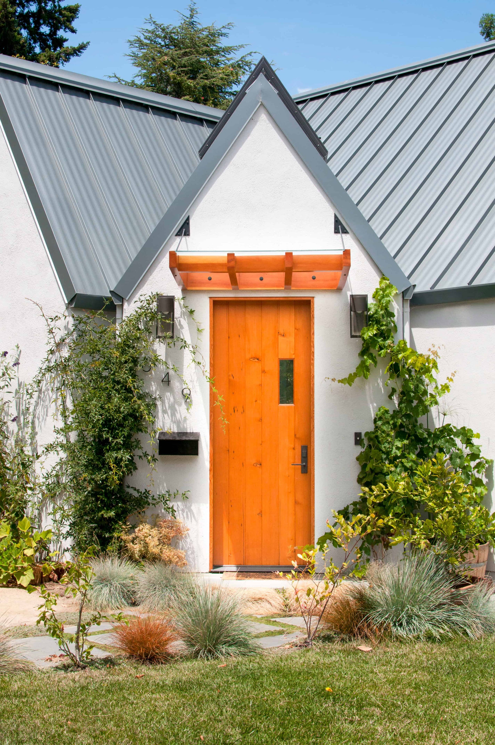 Solid Wood front door on a white house