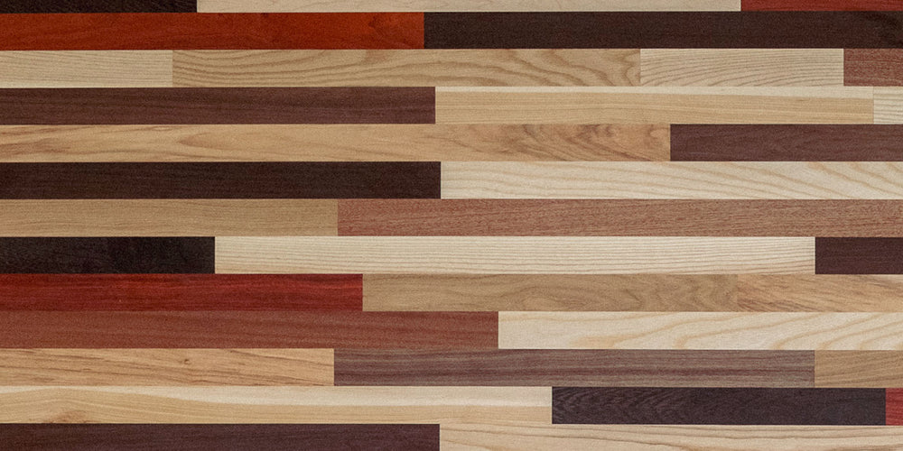 closeup of wood countertop with several contrasting wood species pieces