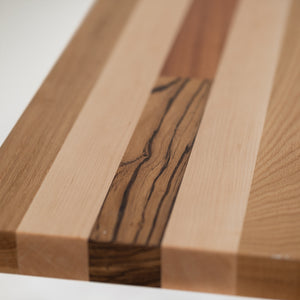 closeup of Palomino countertop with Zebrawood, Maple, and Black Walnut