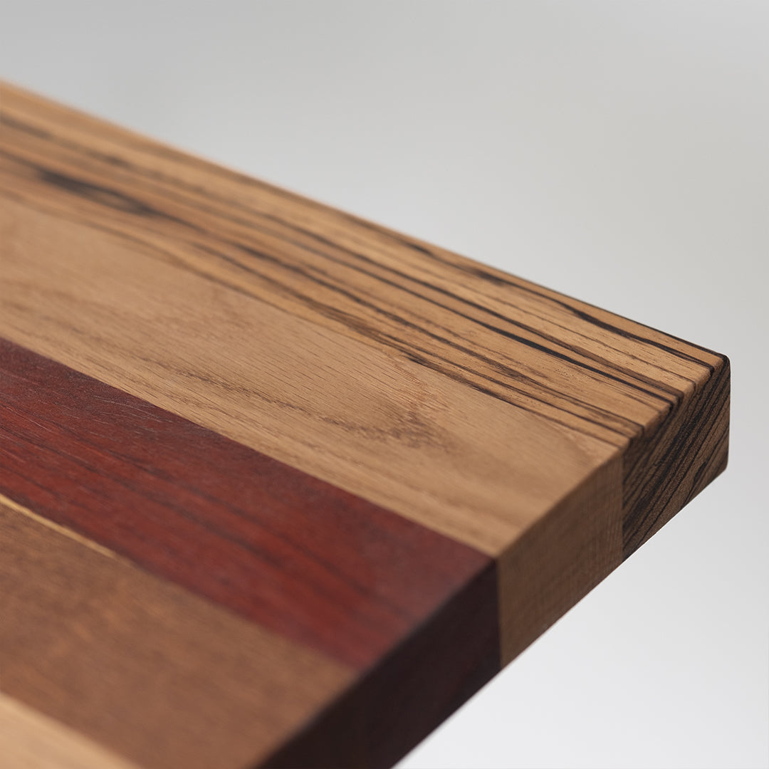 closeup photo of countertop with Zebrawood, White Oak, Padauk, and Walnut