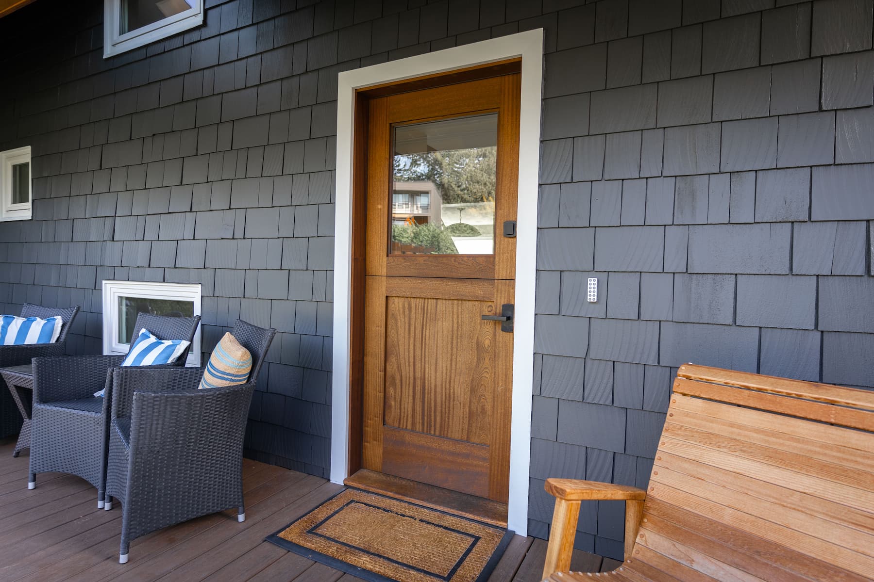 Custom wood dutch door with large glass panel