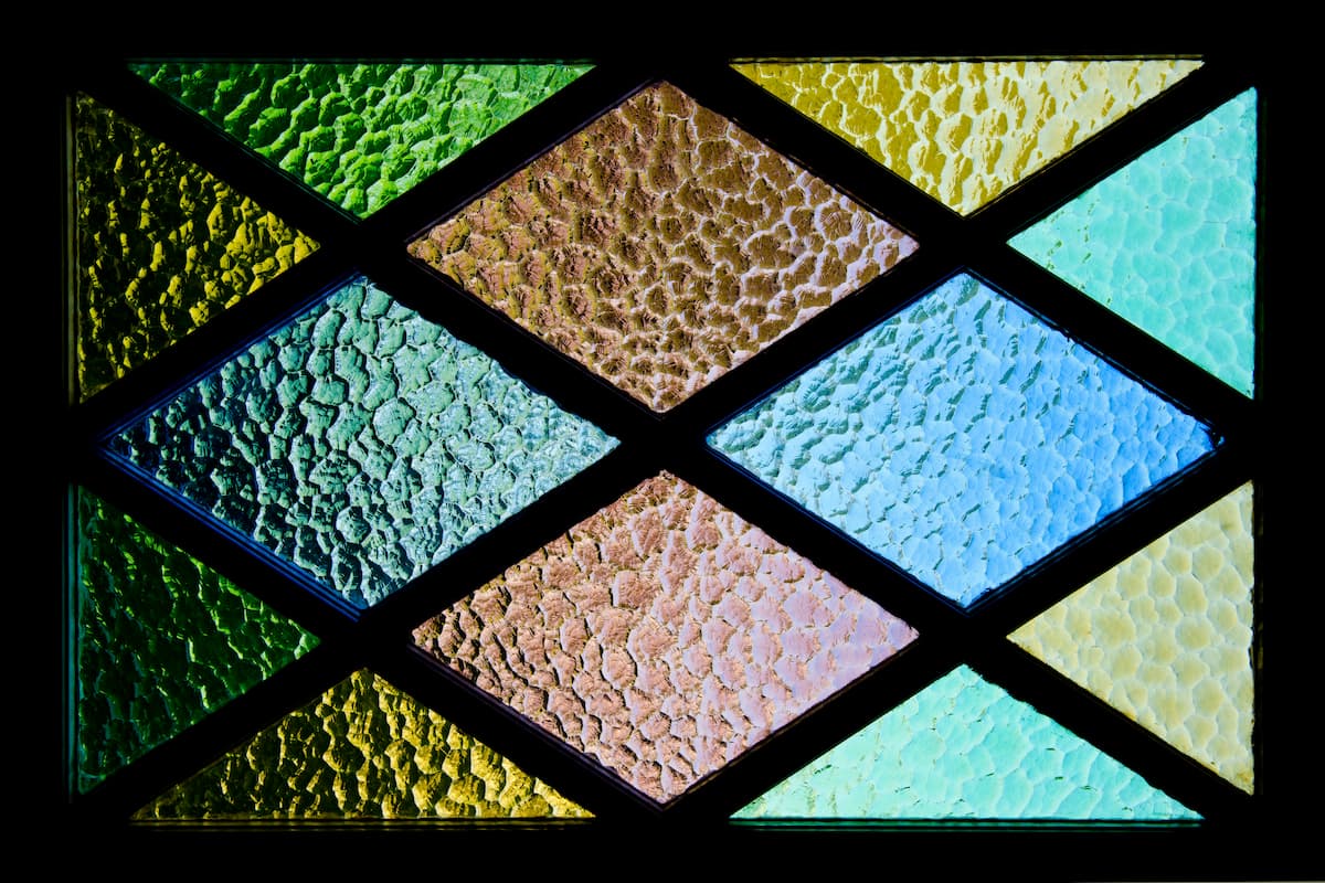 a closeup photo of diamond-shaped stain glass