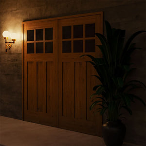 Whidbey Craftsman Traditional Carriage Doors at night