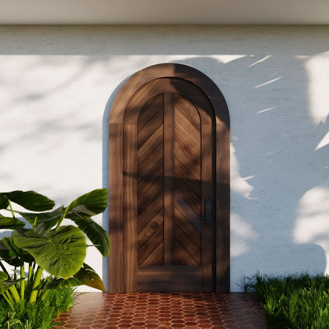 Chevron Panel Round Top Door on modern home with matching casing in Black Walnut