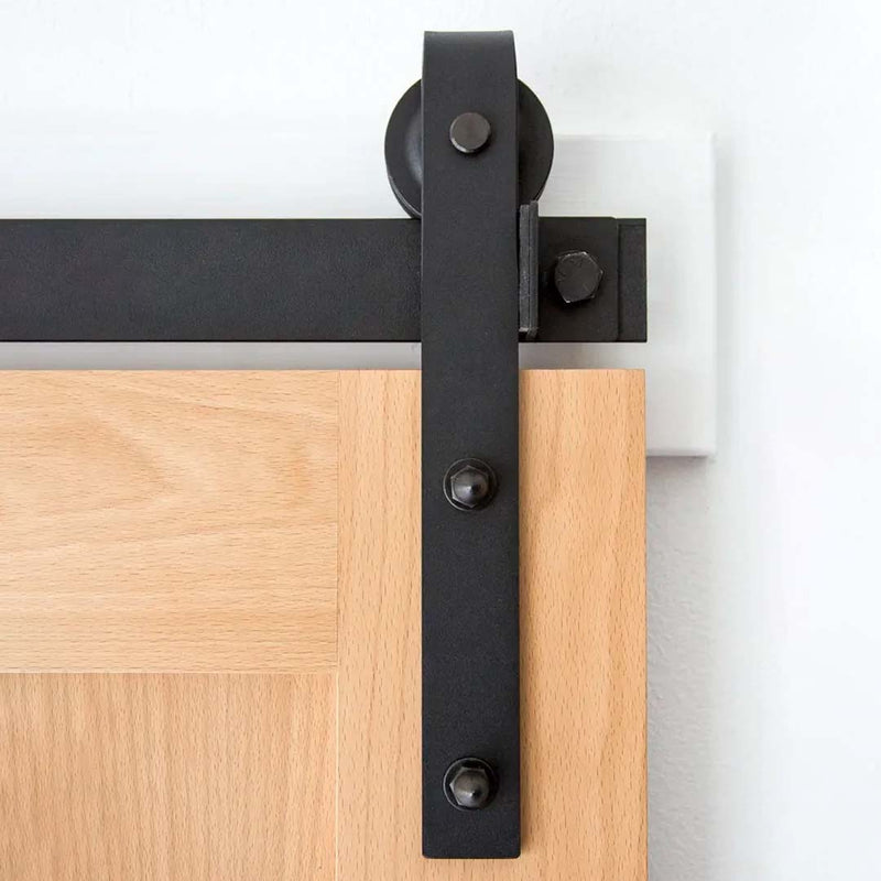 Classic Flat Track barn door hardware on a beech wood door