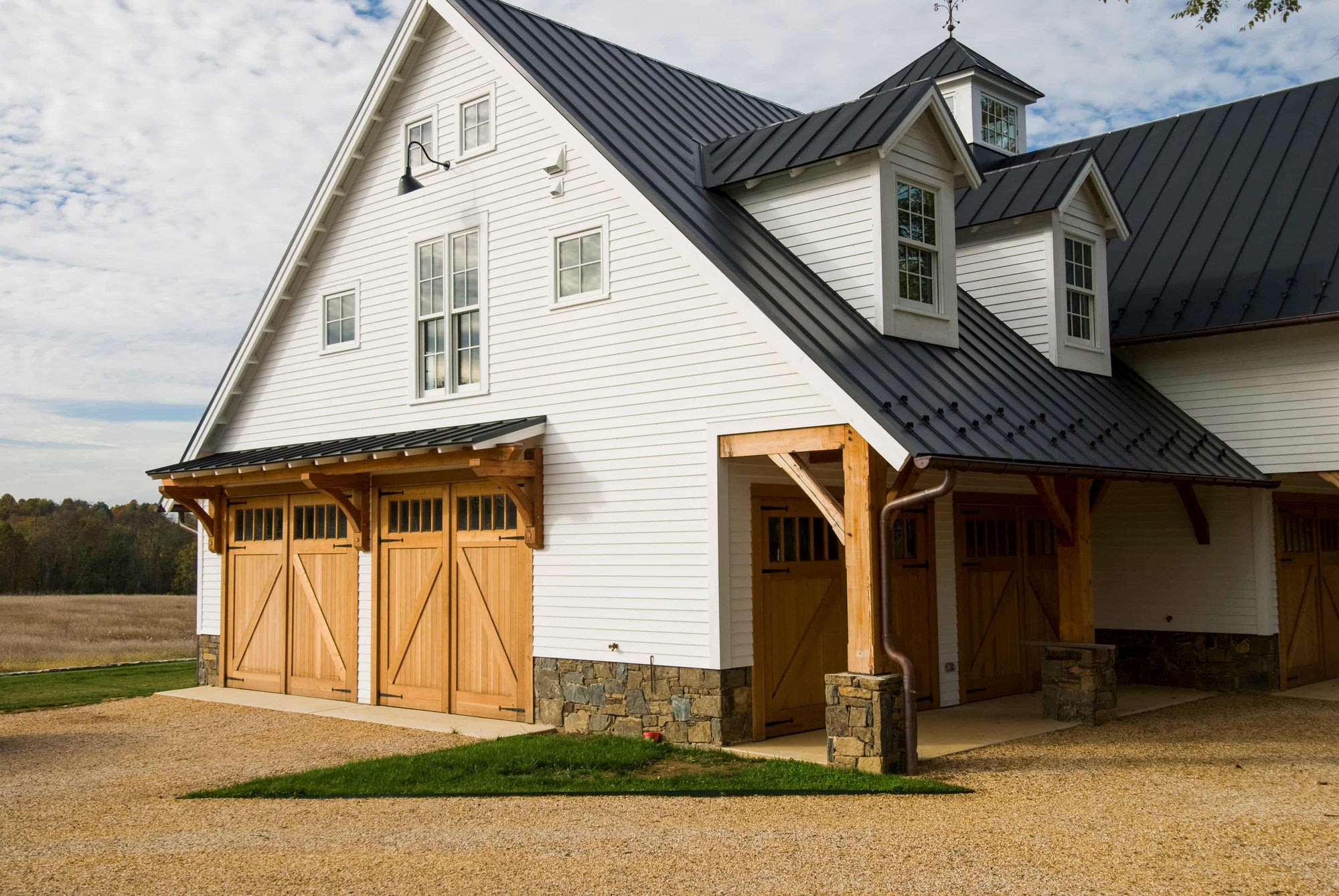 Four Sets of Carriage Doors installed in a barn house
