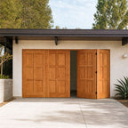 Wooden garage doors on a modern house with trees in the background