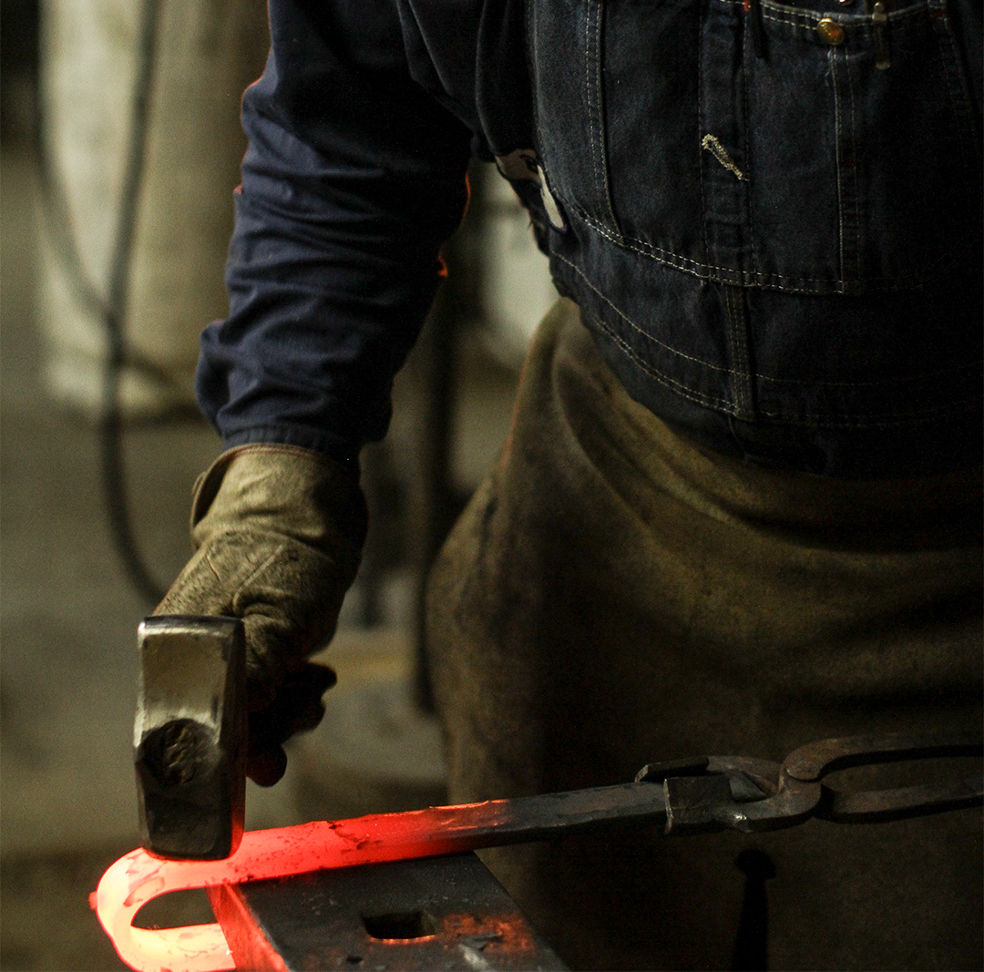 RealCraft's blacksmith hand-forging barn door hardware hangers