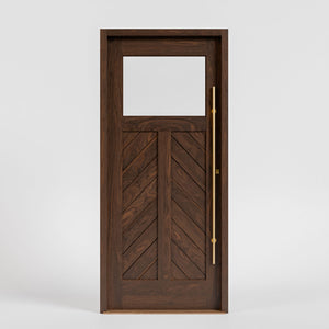 Laguna Chevron Paneled Solid Wood Exterior Door With Window with casing, threshold and brass pull on a white background 