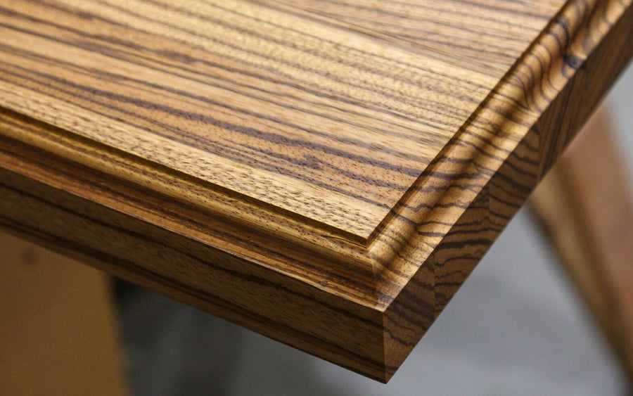 Roman Ogee edging on zebrawood countertop