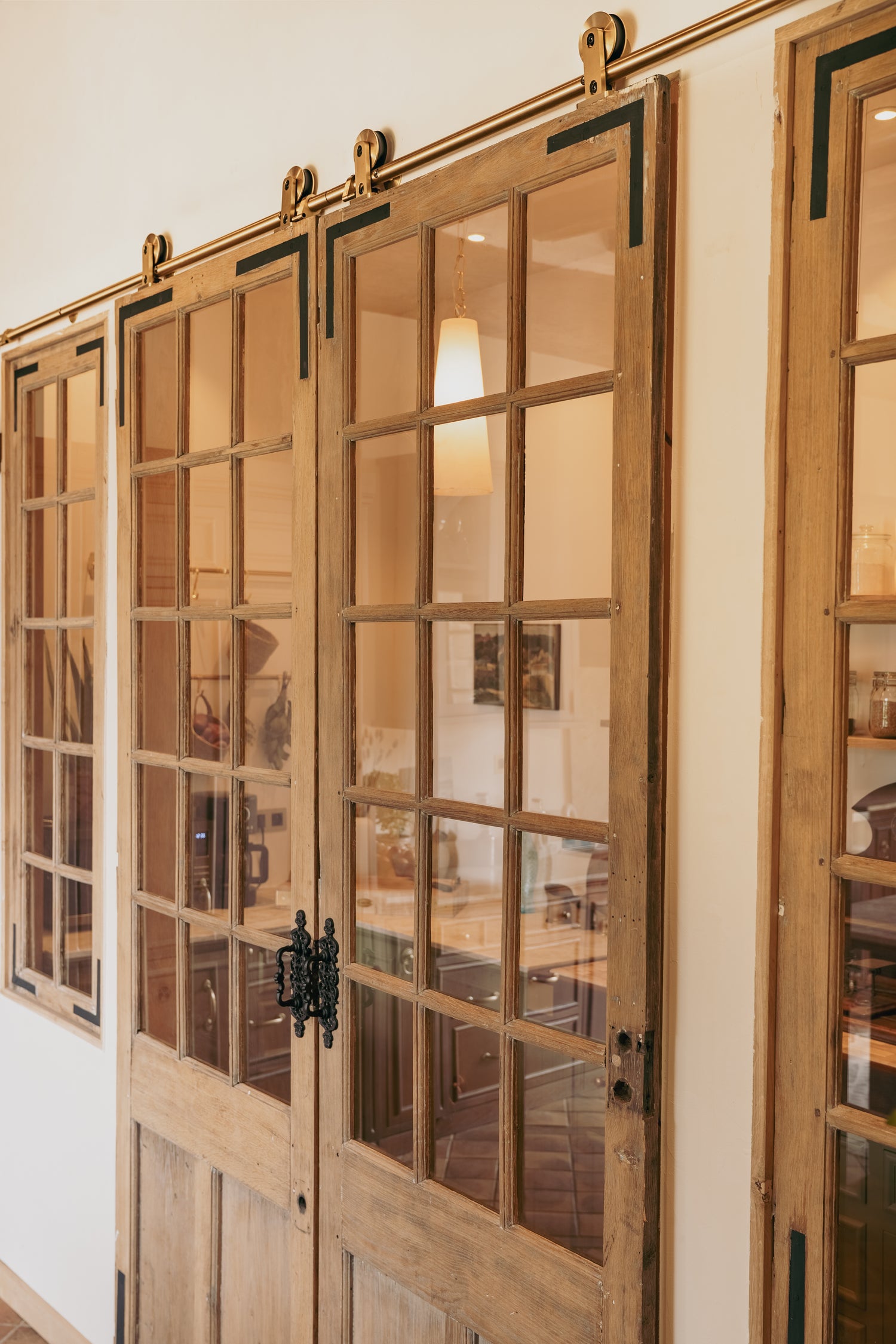 Restored French chateau doors with Swiss Rod hardware