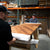 Two Craftsmen wrapping a barn door for shipping