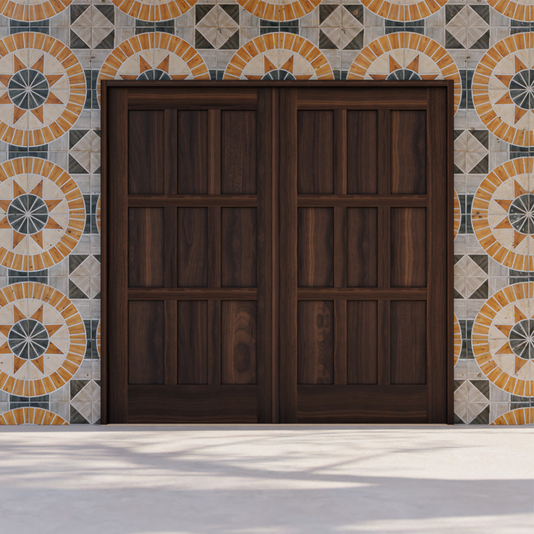 Walnut Wood Anacortes Nine Panel Carriage Style Garage Door in a tiled blue and yellow wall