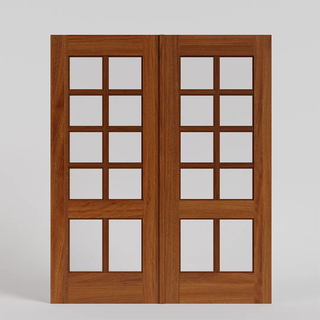 Pair of wooden double french doors with glass panels on a white background