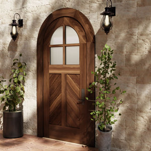 Chevron Panel Round Top Door with window in matched casing on stone house in Black Walnut