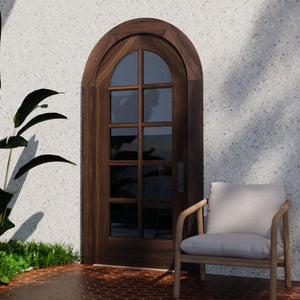 Round Top French style glass door in black walnut with matching casing on a contemporary exterior