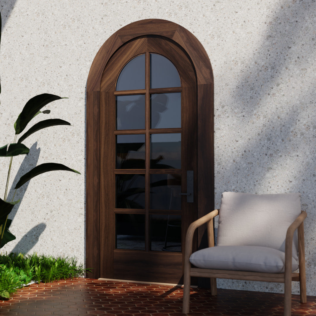 Round Top French style glass door in black walnut with matching casing on a contemporary exterior