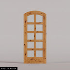 Padua arched door in Knotty Alder, with ten glass panes in two columns. Labeled wood species view.