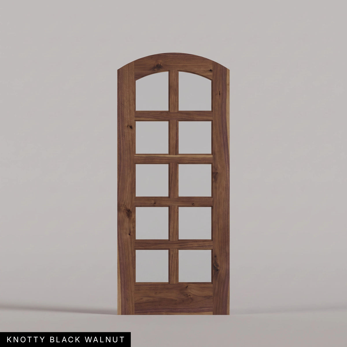 Padua arched door in Knotty Black Walnut, with ten glass panes in two columns. Labeled wood species view.