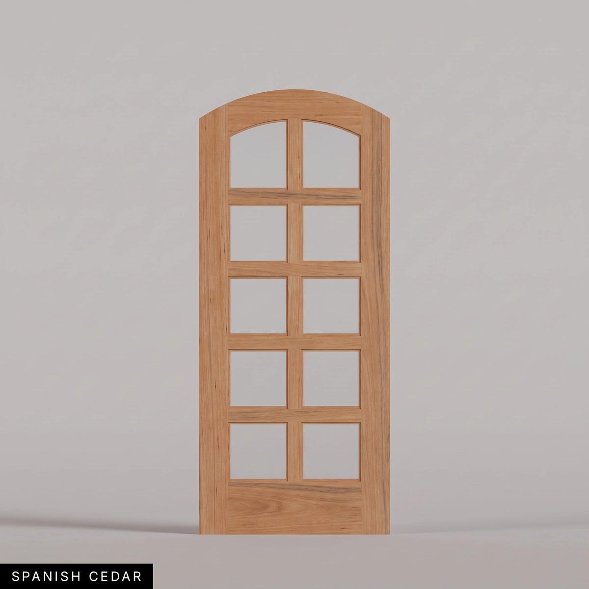 Padua arched door in Spanish Cedar, with ten glass panes in two columns. Labeled wood species view.