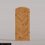 Palermo arched door in Knotty Alder, with a downward-pointing herringbone pattern. Labeled wood species view.