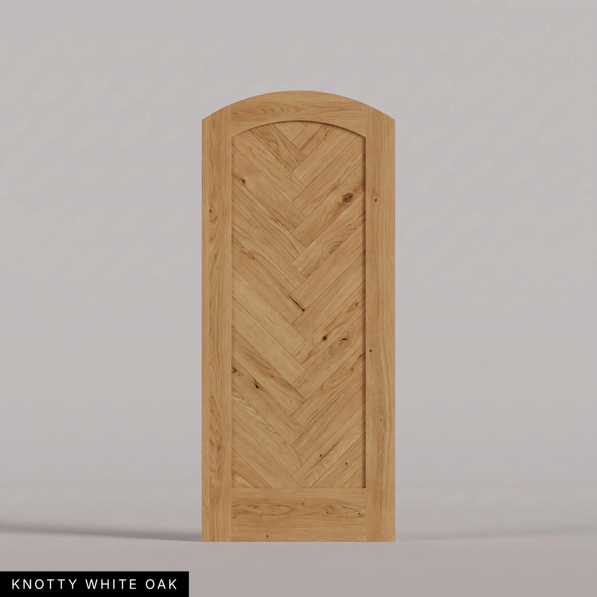 Palermo arched door in Knotty White Oak, with a downward-pointing herringbone pattern. Labeled wood species view.