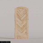 Palermo arched door in Rustic Maple, with a downward-pointing herringbone pattern. Labeled wood species view.