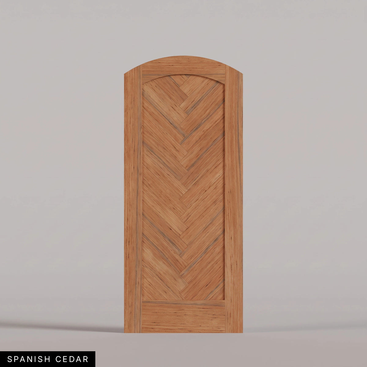 Palermo arched door in Spanish Cedar, with a downward-pointing herringbone pattern. Labeled wood species view.