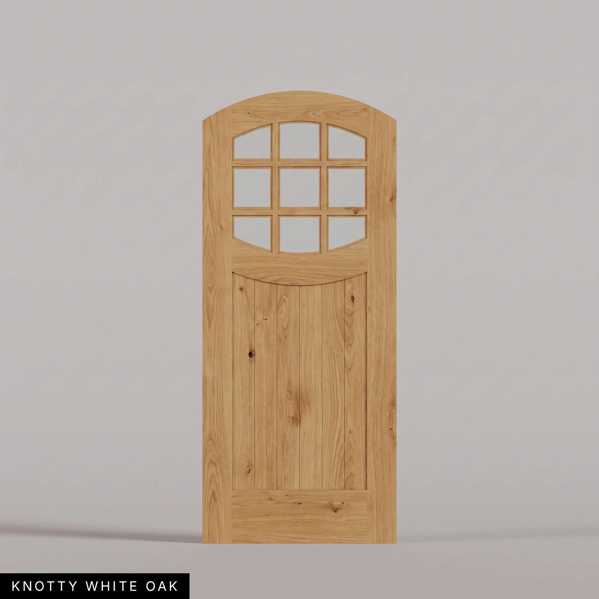 Portofino arched door in Knotty White Oak, with nine upper glass panes and a vertical-plank lower panel. Labeled wood species view.