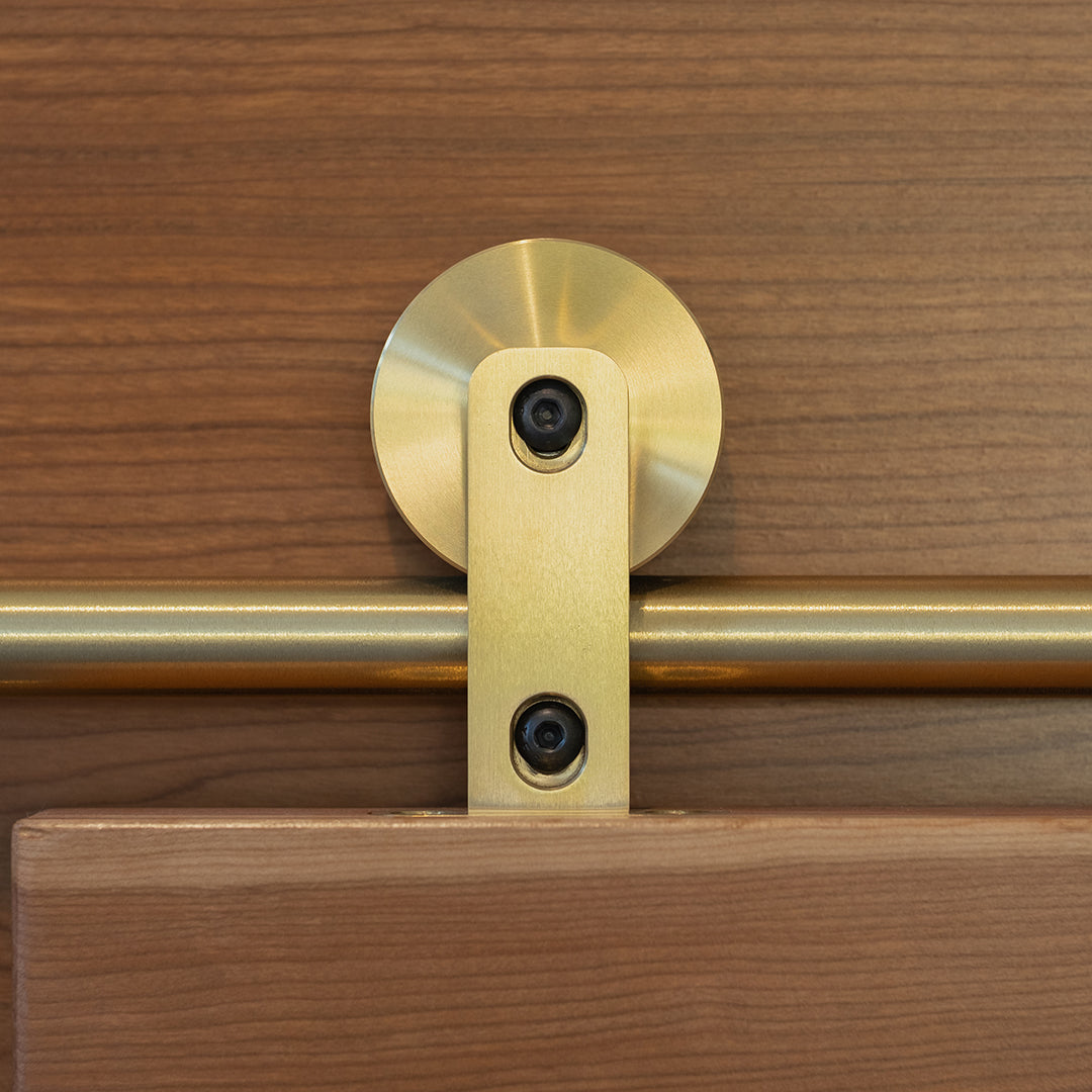 Swiss Rod brass hangers shown in context on Walnut door