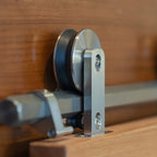Stainless Steel Swiss Rod hanger closeup in context side angle 
