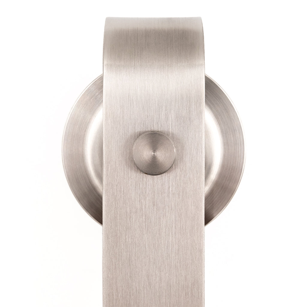 stainless steel sliding door hanger on a white background