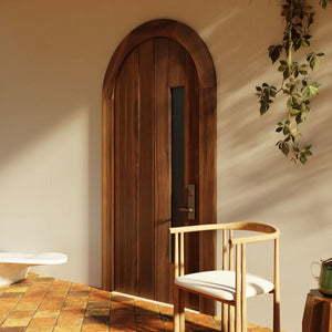 Alternate view of round top flush plank door with window with matched casing in Black Walnut on modern home