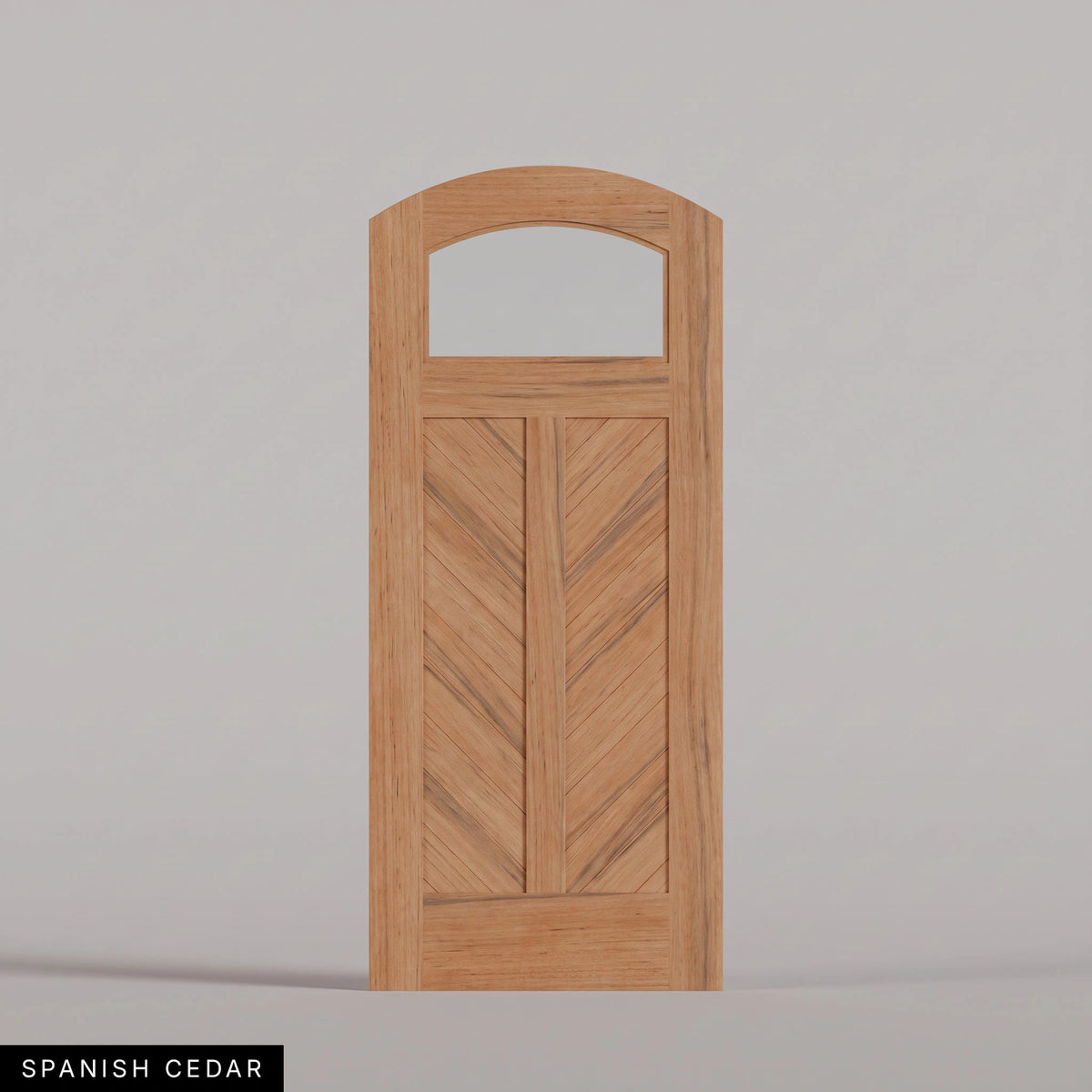 Sorrento arched door in Spanish Cedar, with an upper glass pane and chevron wood panels divided by a center stile. Labeled wood species view.