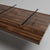 render of walnut countertop with alternate view of steel strap countertops