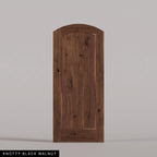 Tivoli arched door in Knotty Black Walnut, with a vertical-plank wood panel. Labeled wood species view.